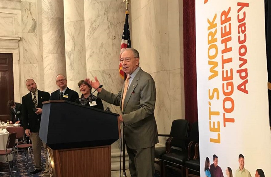Men standing at a lectern in Capitol Hill in Washington DC