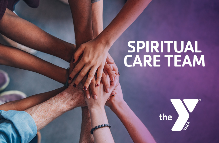 Group of hands stacked on top of each other in solidarity