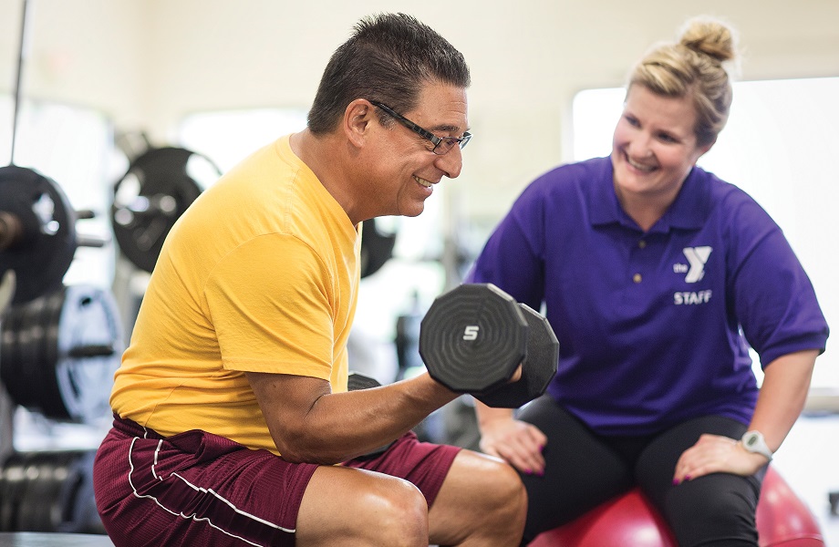 Senior Working Out with Y Trainer