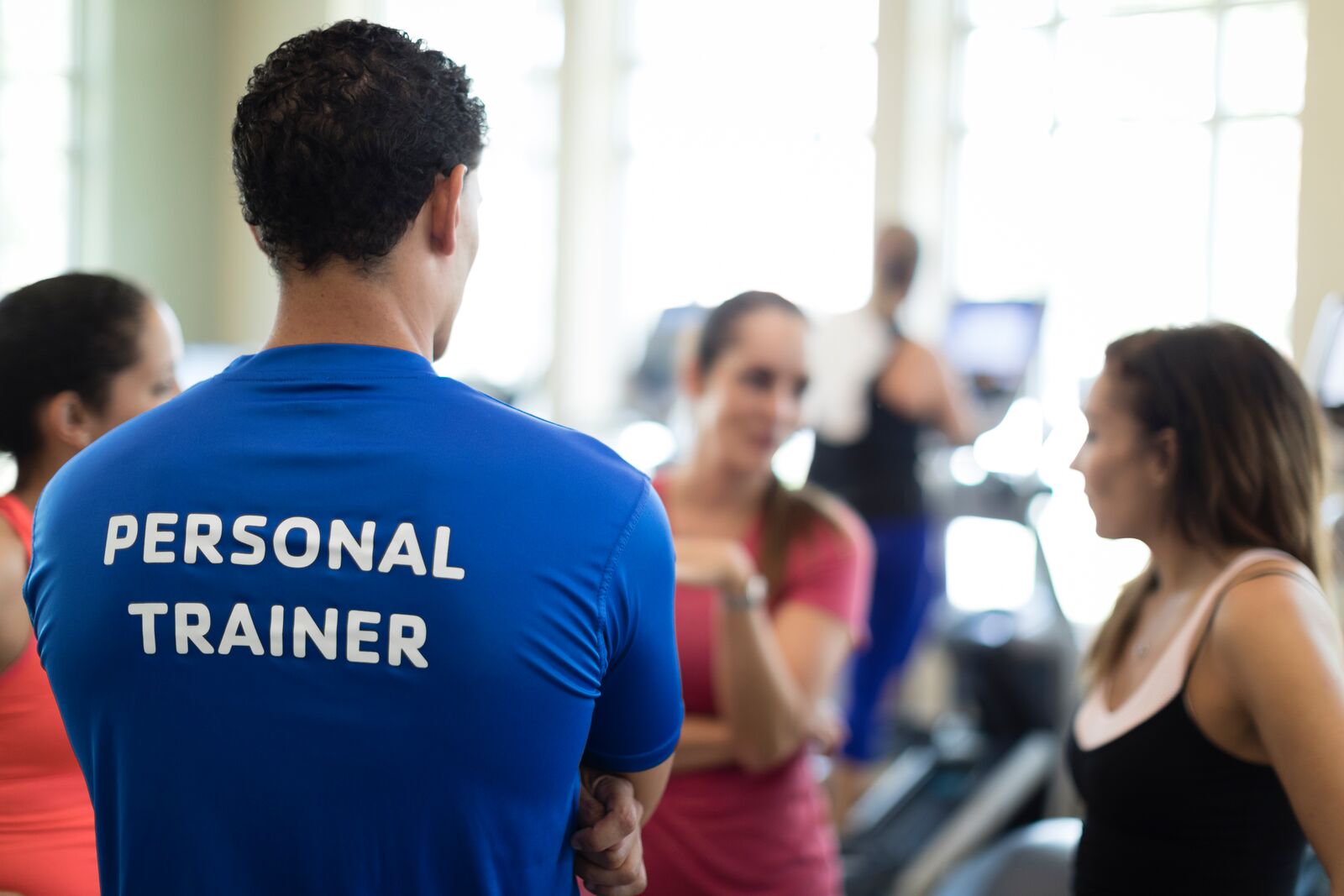 Personal Trainer with a t-shirt on it that says Personal Trainer