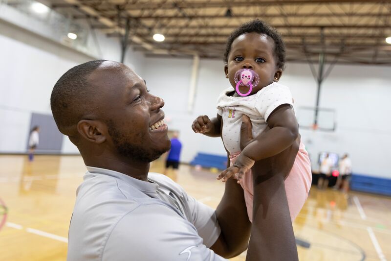 Father and Child in Gymnasium