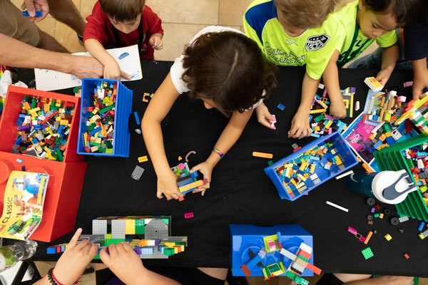 Kids at Table Doing Healthy Kids Day Activities