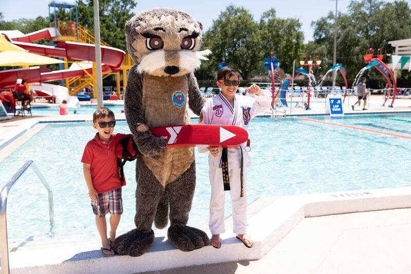 Otter with Kids by the Pool