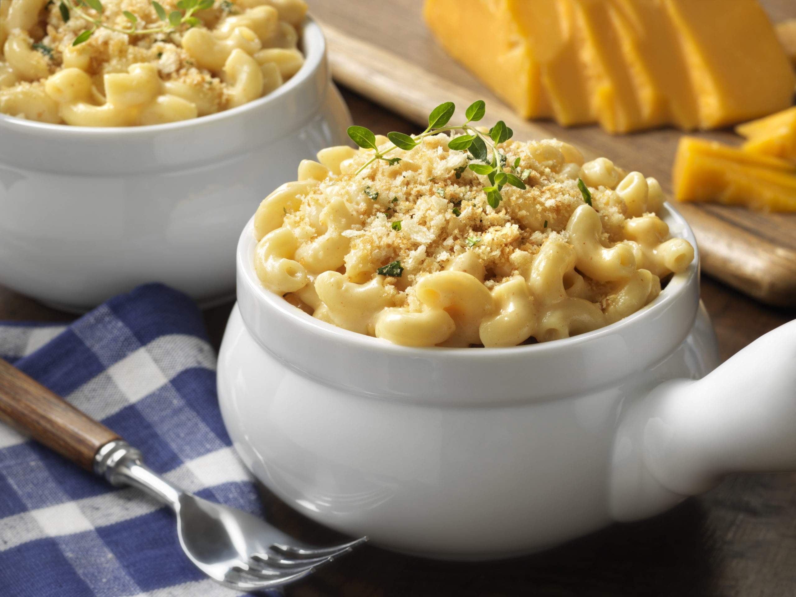 Butternut squash mac and cheese in white bowls