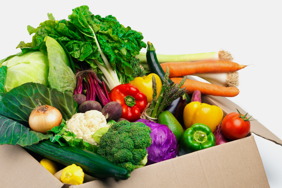 Fresh Vegetables and Fruits in a Brown Bag