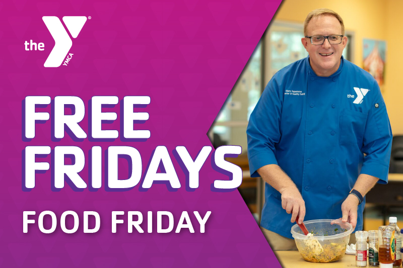 Image of Chef Gary wearing a blue chef's coat with a white Y logo doing a food demonstration