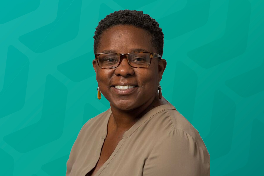 Headshot of Jocelyn Boyd in front of green chevron background