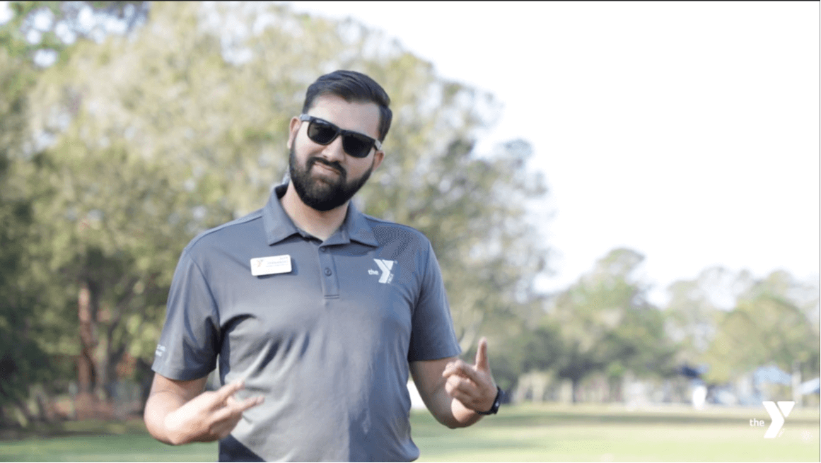 Sports Director Alex Fernandez on the soccer field