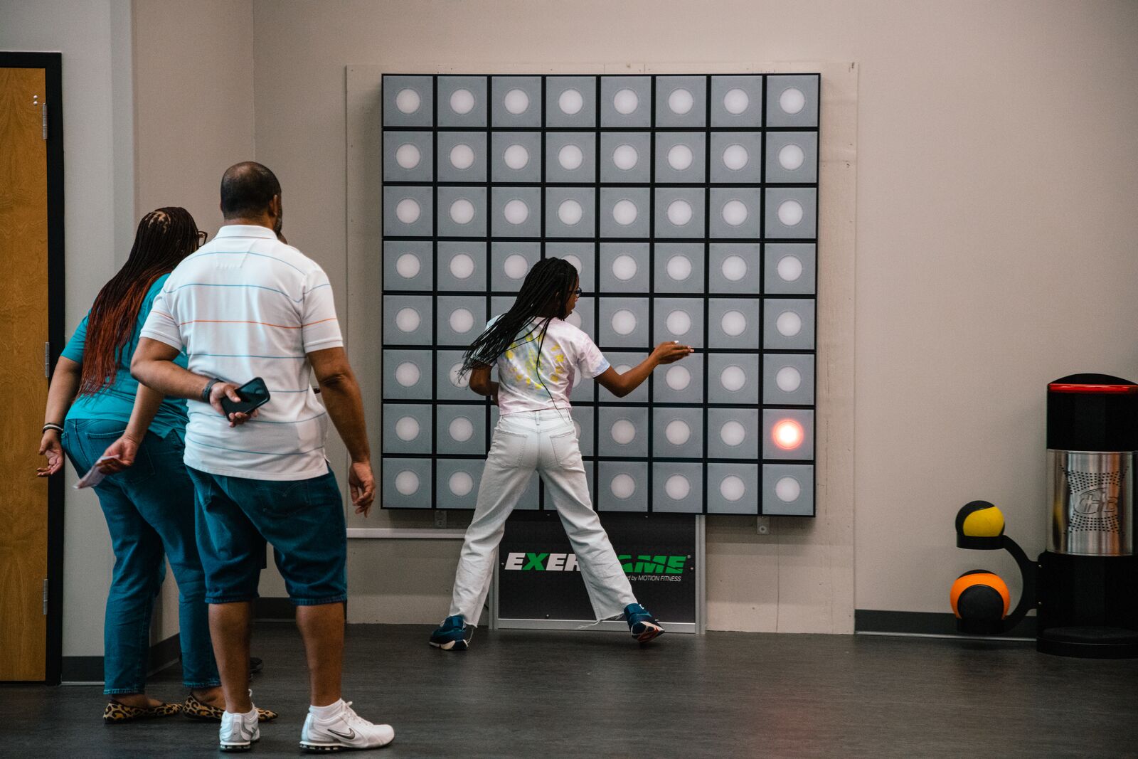 A family using the fitnasium at the Leonard & Marjorie Williams Family YMCA