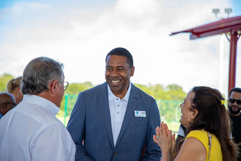 YMCA of Central Florida CEO Kevin Bolding talking with people at an event