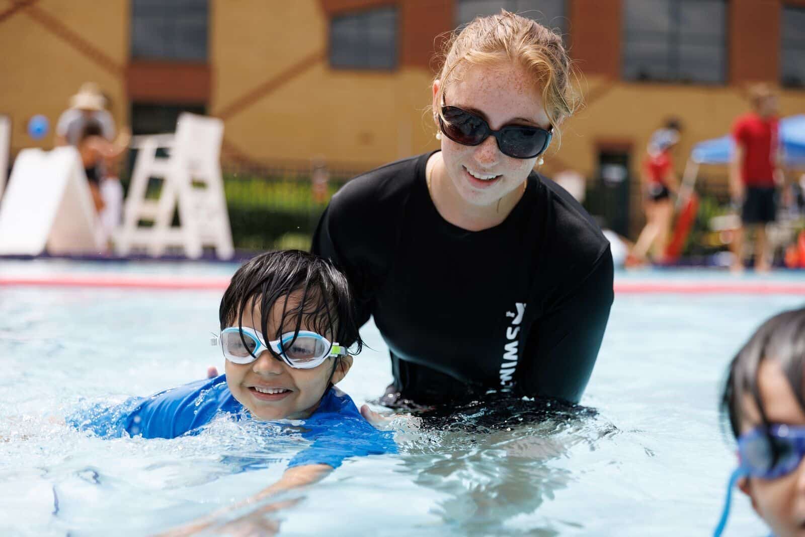 YMCA swim lesson instructor during a Preschool class