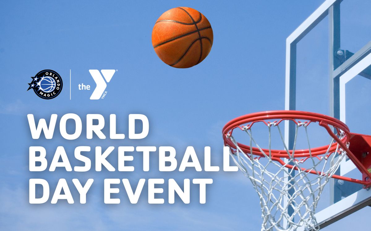 World Basketball Day Event photo showing a ball flying through the air before it goes into an outdoor basketball hoop